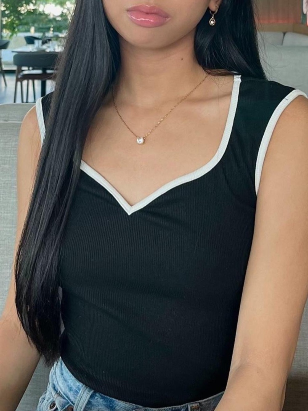 Black and white tank top with white trim sweatheart neckline